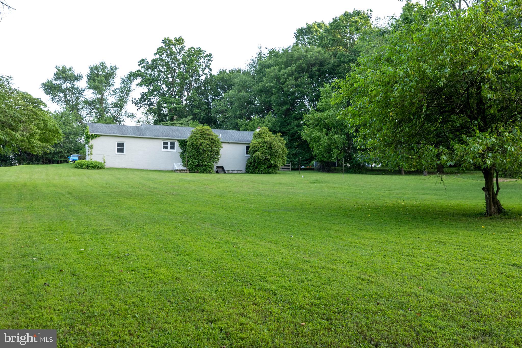 540 Doe Run Road Coatesville, PA 19320 - Photo 5 of 35 a view of a house with a yard