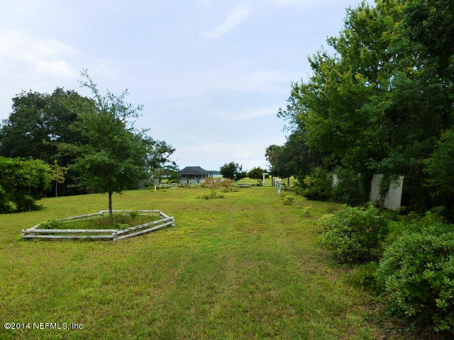 15775 Shellcracker Road Jacksonville, FL 32226 - Photo 15 of 25 a view of a golf course with a lake