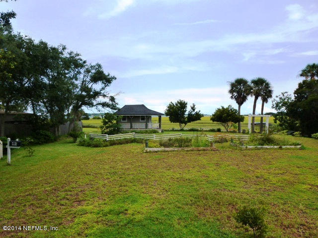 15775 Shellcracker Road Jacksonville, FL 32226 - Photo 16 of 25 a front view of a house with a yard