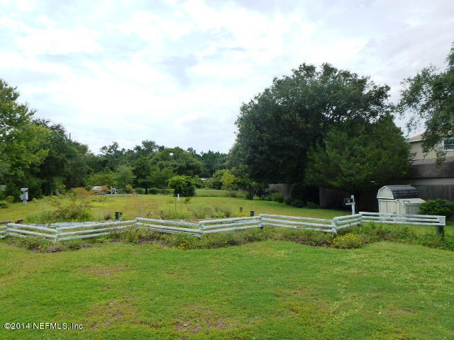 15775 Shellcracker Road Jacksonville, FL 32226 - Photo 22 of 25 a view of a house with a big yard