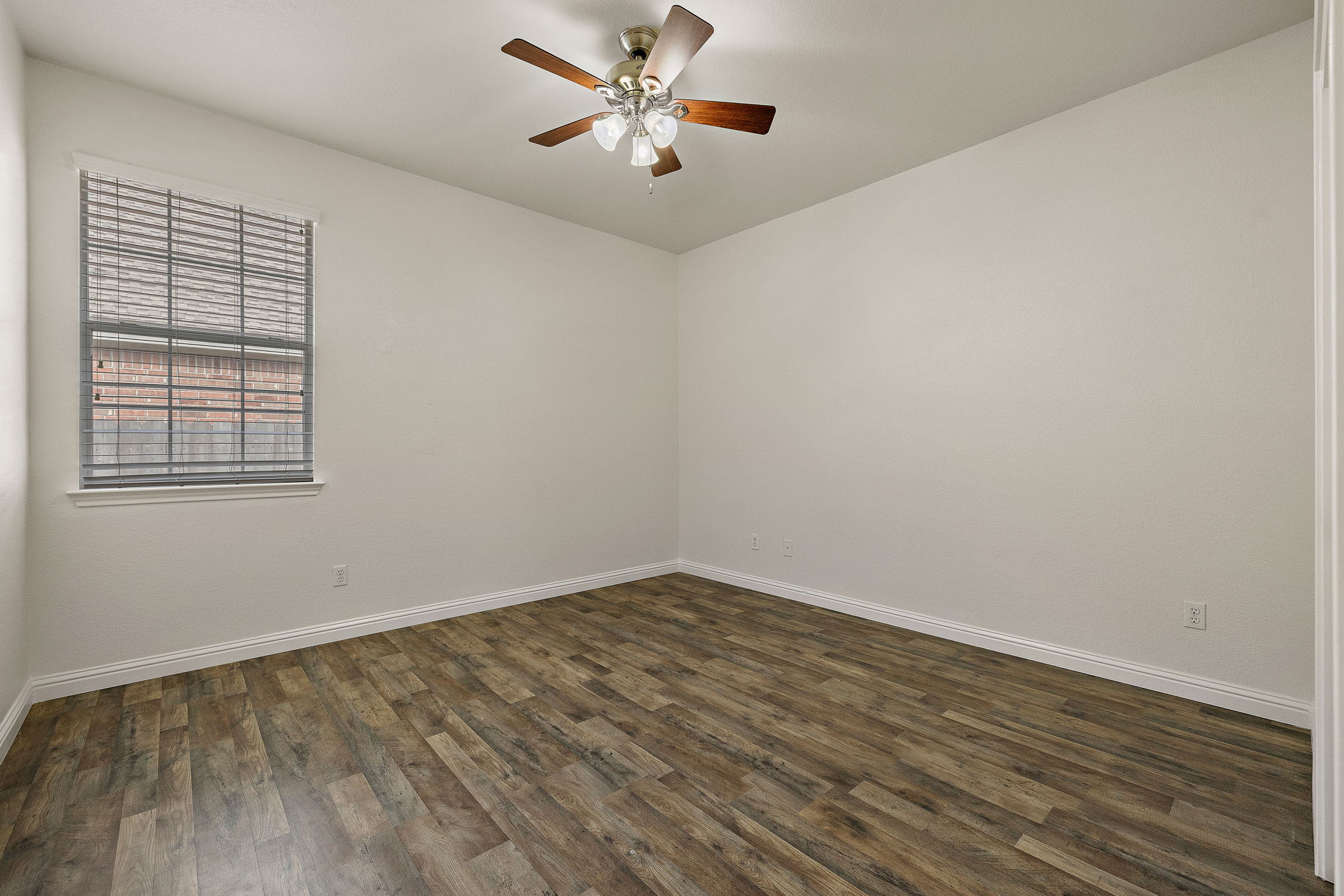 1115 Canyon Maple Road Pflugerville, TX 78660 - Photo 23 of 34 Secondary bedroom with LVP flooring