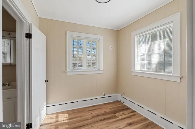 a view of a room that has a window in it