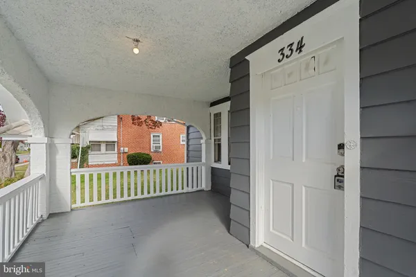 a view of an entryway with a lot of of furniture