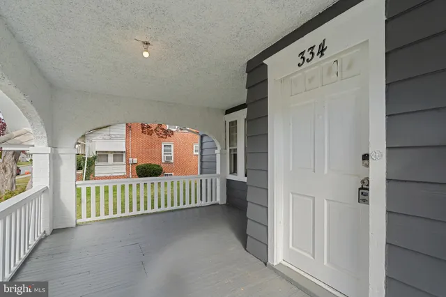 a view of an entryway with a lot of of furniture