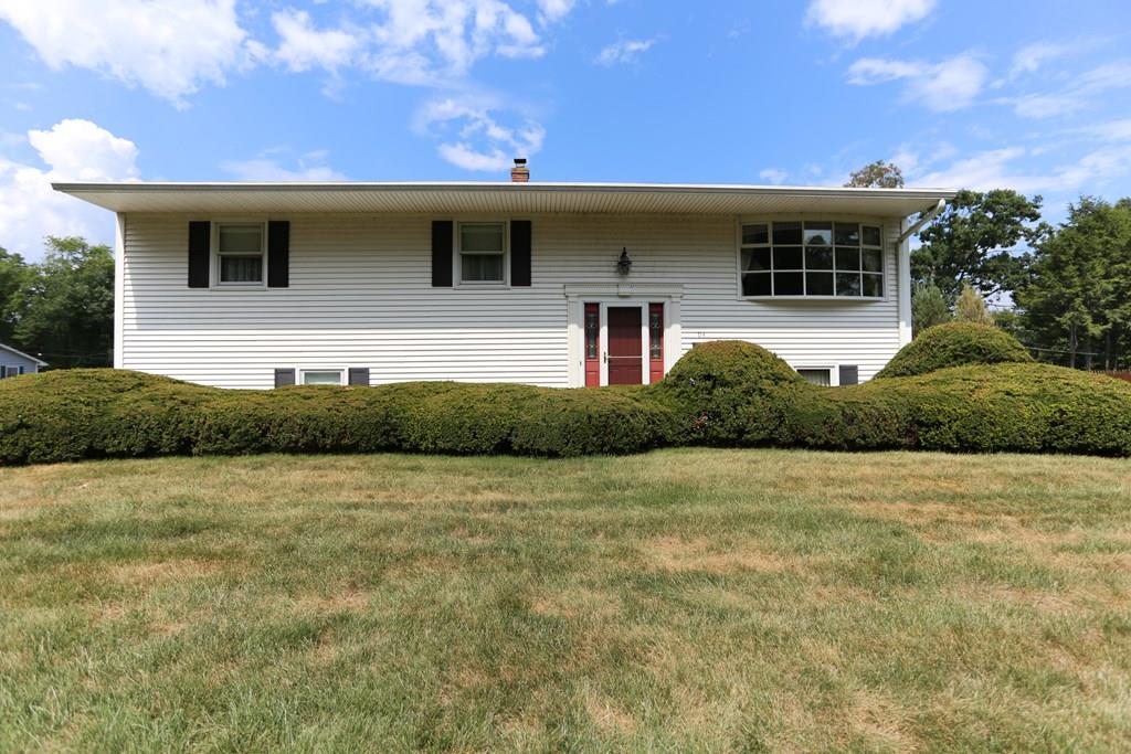 94 Hillview Road Holyoke, MA 01040 - Photo 1 of 9 a front view of a house with a yard