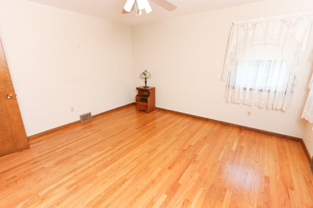 94 Hillview Road Holyoke, MA 01040 - Photo 7 of 9 a view of empty room with wooden floor