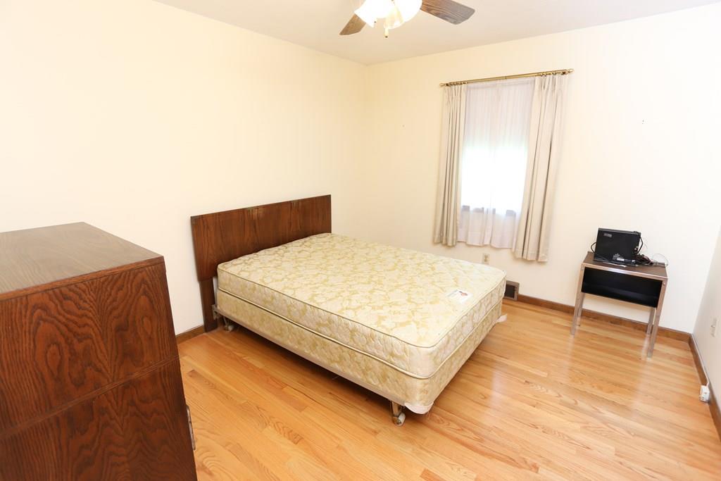 94 Hillview Road Holyoke, MA 01040 - Photo 8 of 9 a bedroom with a bed and a couch