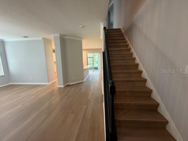 1885 Scrub Jay Road Apopka, FL 32703 - Photo 14 of 29 a view of entryway and hall with wooden floor