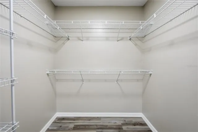 a view of a room with racks on the wall