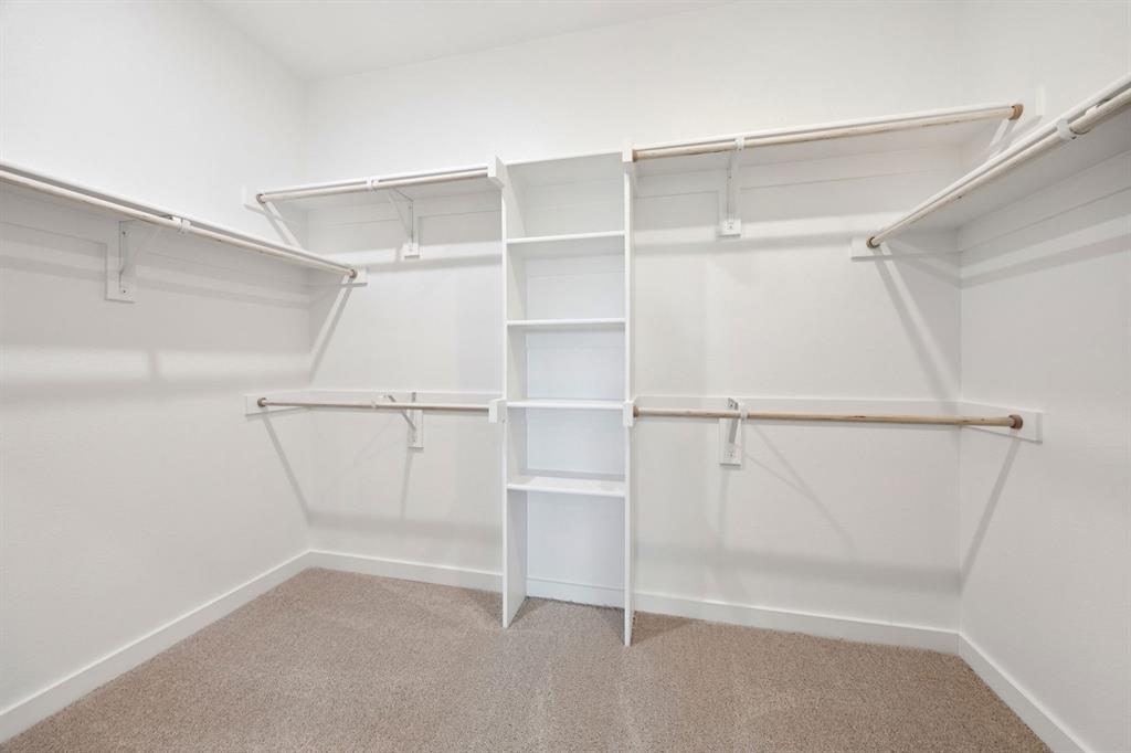 1216 Bellflower Road Lavon, TX 75166 - Photo 17 of 27 Primary Closet in the Mesquite home plan by Trophy Signature Homes – REPRESENTATIVE PHOTO