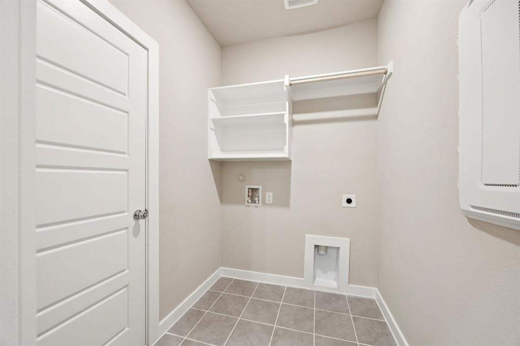 1216 Bellflower Road Lavon, TX 75166 - Photo 18 of 27 Utility Room in the Mesquite home plan by Trophy Signature Homes – REPRESENTATIVE PHOTO