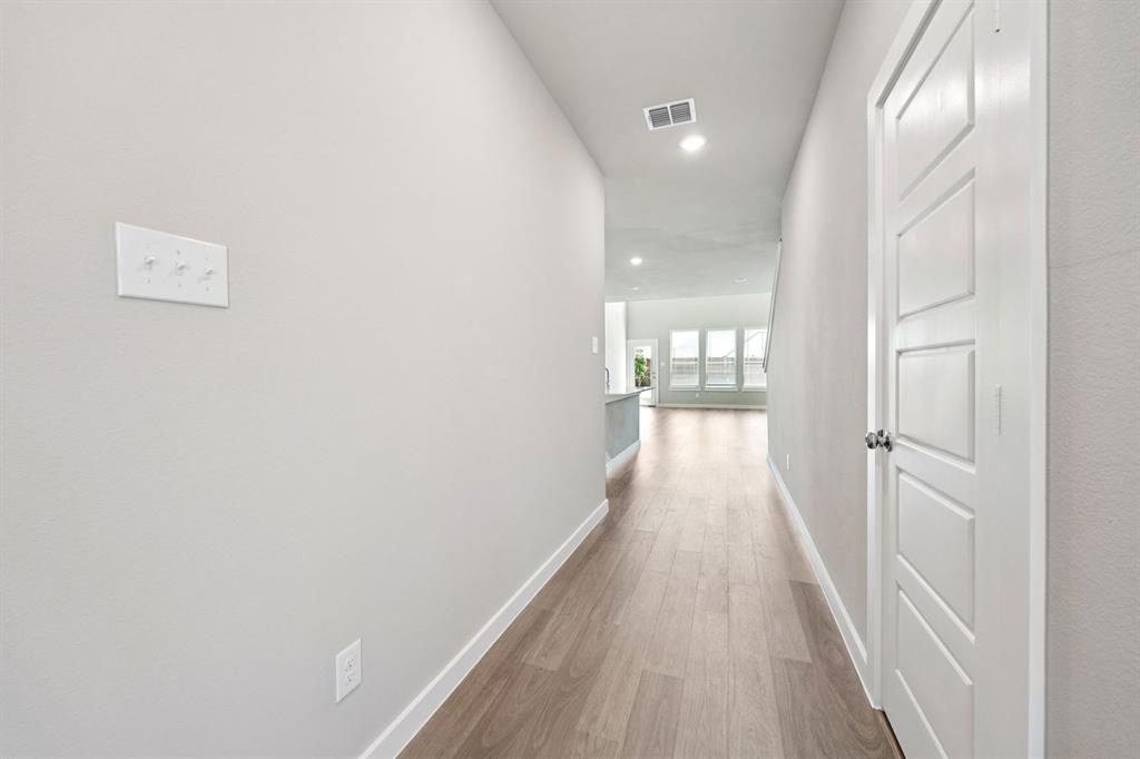 1216 Bellflower Road Lavon, TX 75166 - Photo 25 of 27 Entryway in the Mesquite home plan by Trophy Signature Homes – REPRESENTATIVE PHOTO