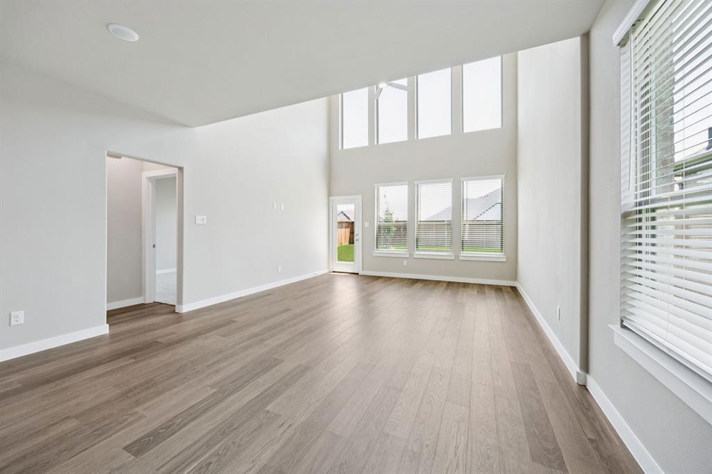 1216 Bellflower Road Lavon, TX 75166 - Photo 9 of 27 Open First Floor in the Mesquite home plan by Trophy Signature Homes – REPRESENTATIVE PHOTO