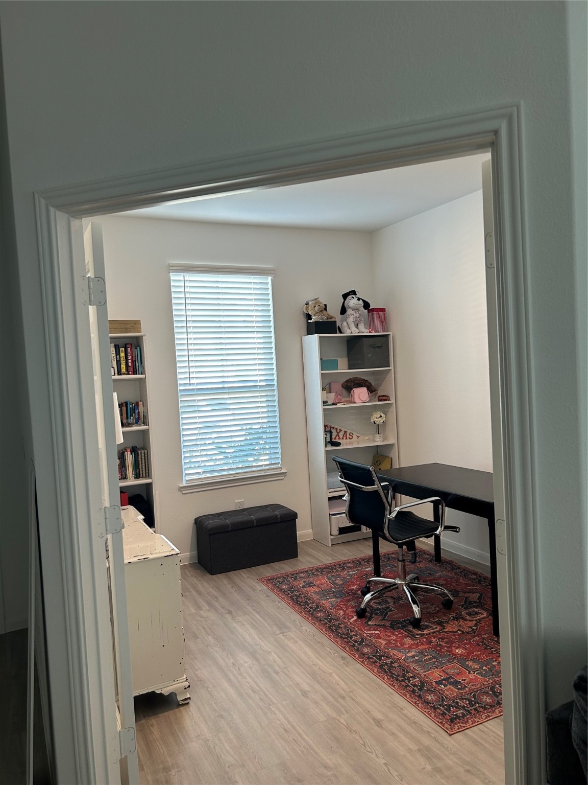 23415 Weir Box Road Hockley, TX 77447 - Photo 11 of 35 a view of a workspace with furniture and a window