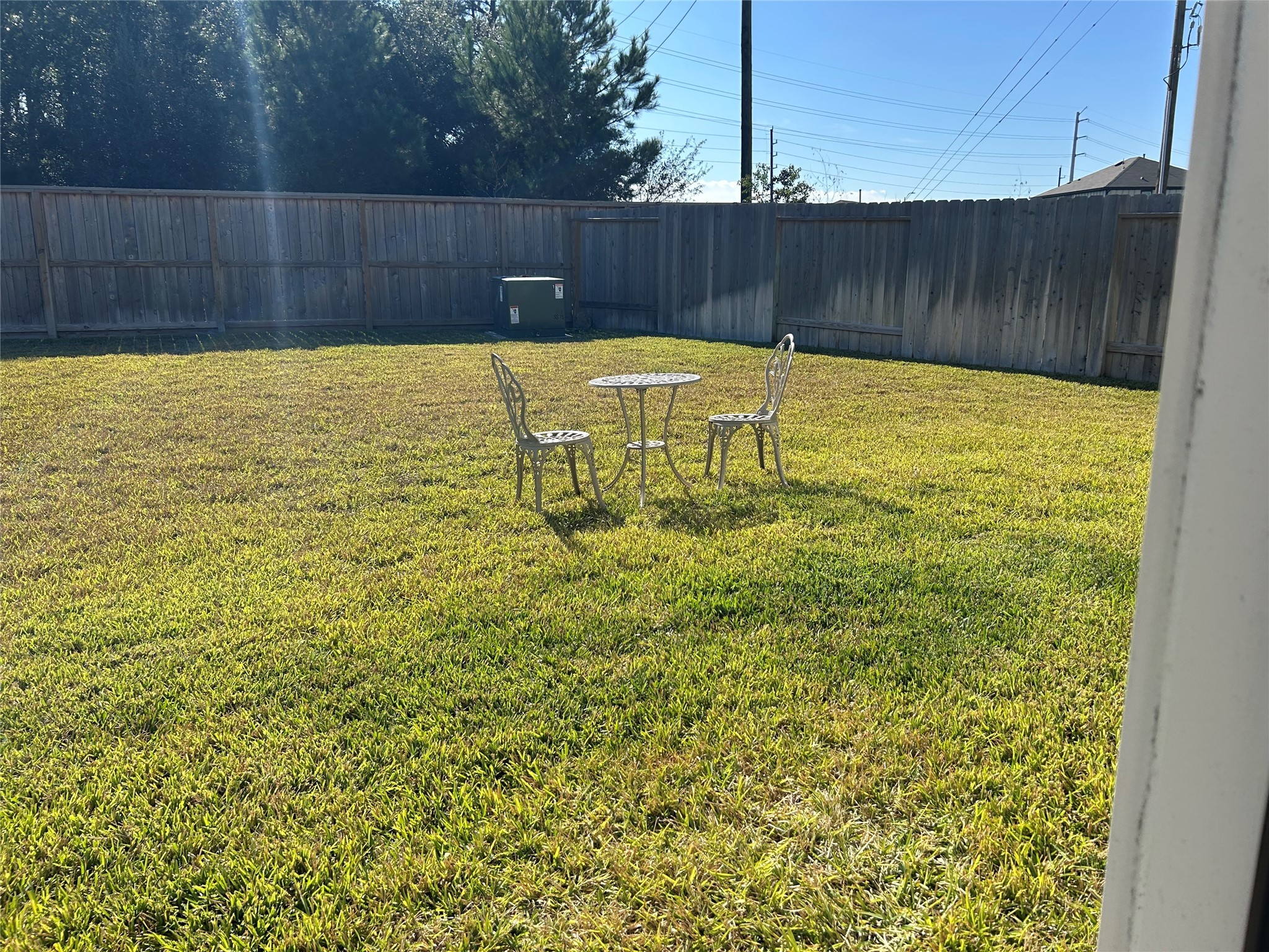 23415 Weir Box Road Hockley, TX 77447 - Photo 17 of 35 a view of a swimming pool with wooden fence
