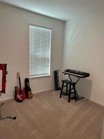 a room with a desk and chair