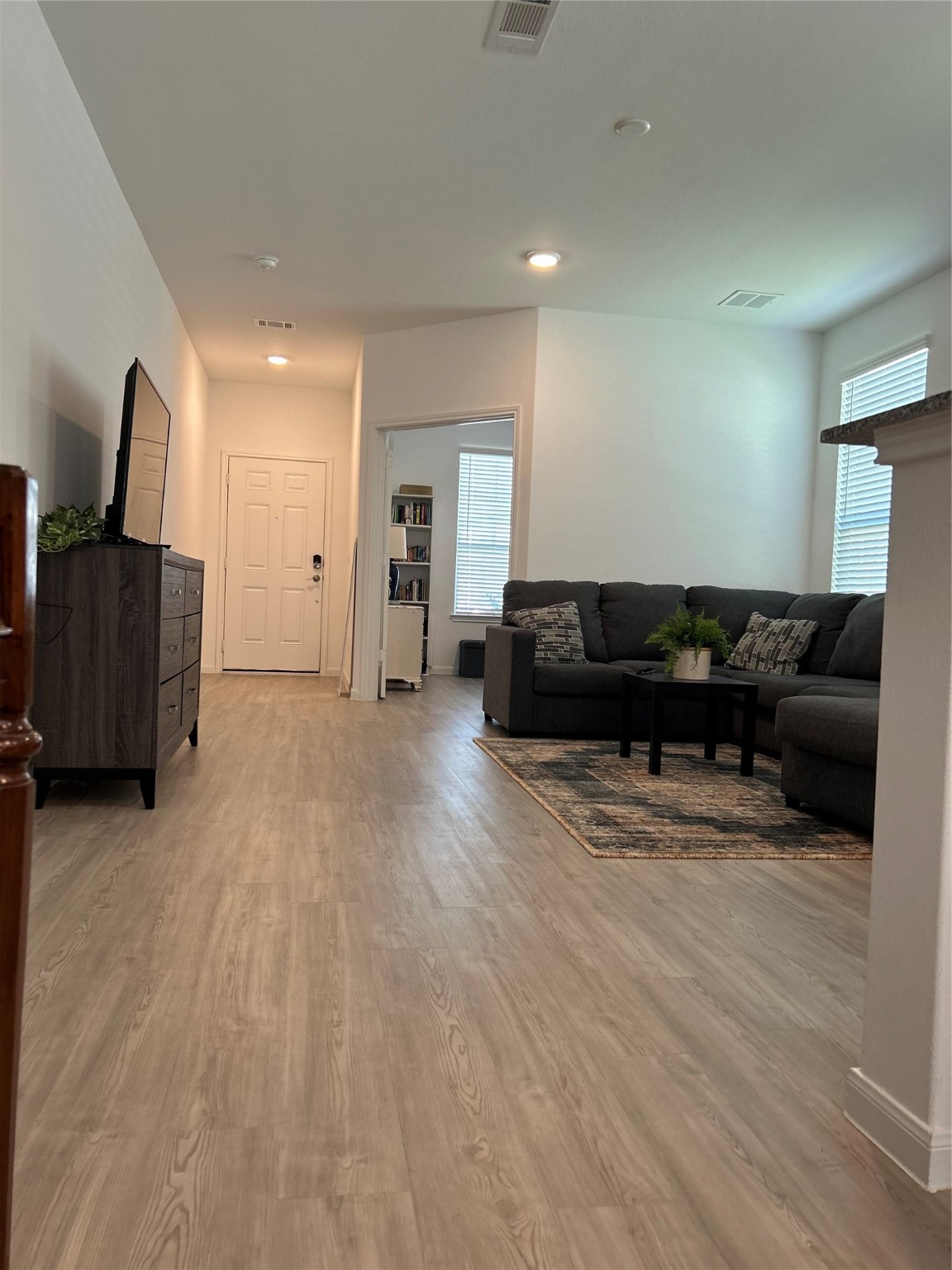 23415 Weir Box Road Hockley, TX 77447 - Photo 33 of 35 a living room with furniture and a flat screen tv