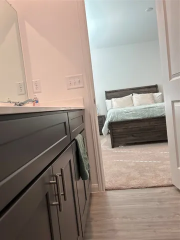 a bathroom with a bathtub and shower