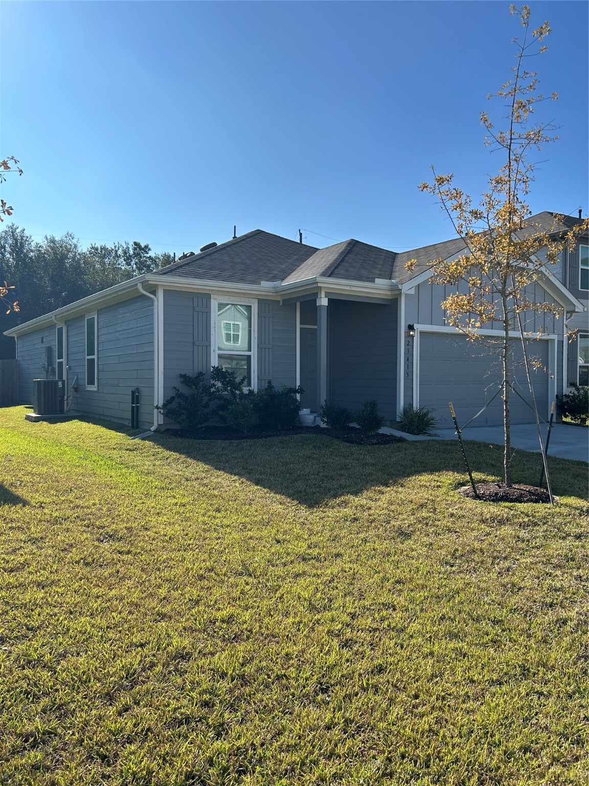 23415 Weir Box Road Hockley, TX 77447 - Photo 7 of 35 a house view with a backyard space