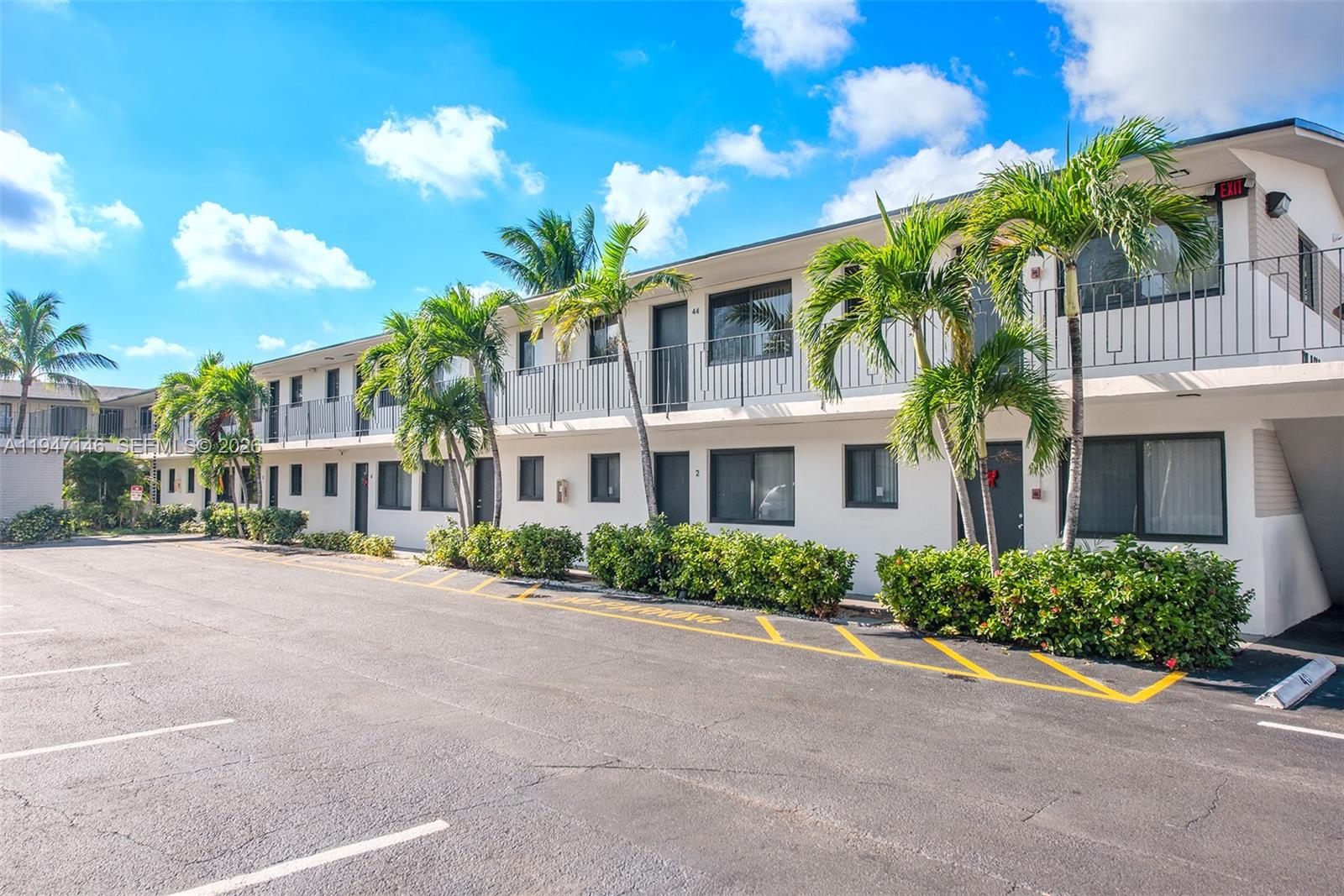 1310 West 29th Street, Unit 28 Hialeah, FL 33012 - Photo 2 of 10 front view of a house with a street