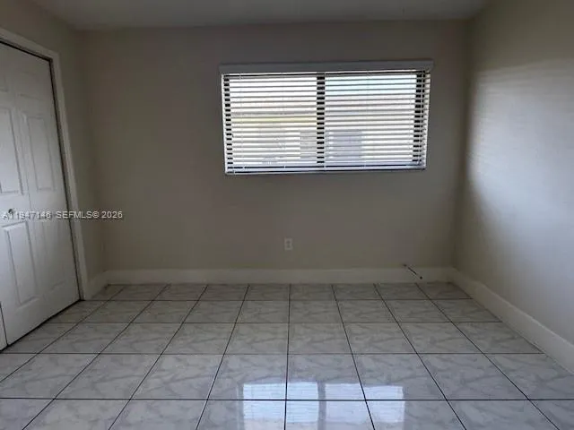 an empty room with a window