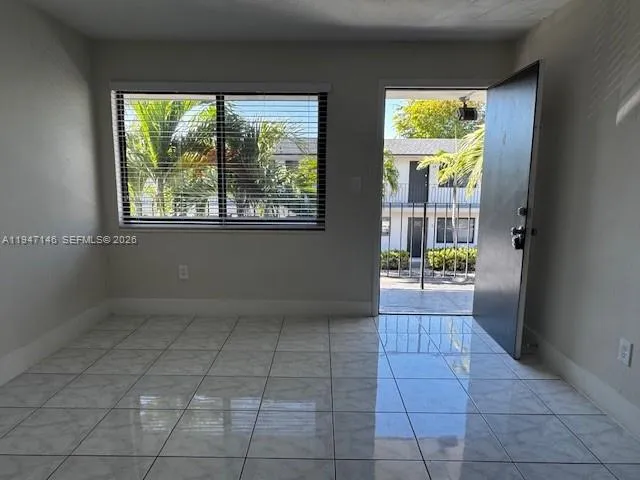 a view of an entryway with a window