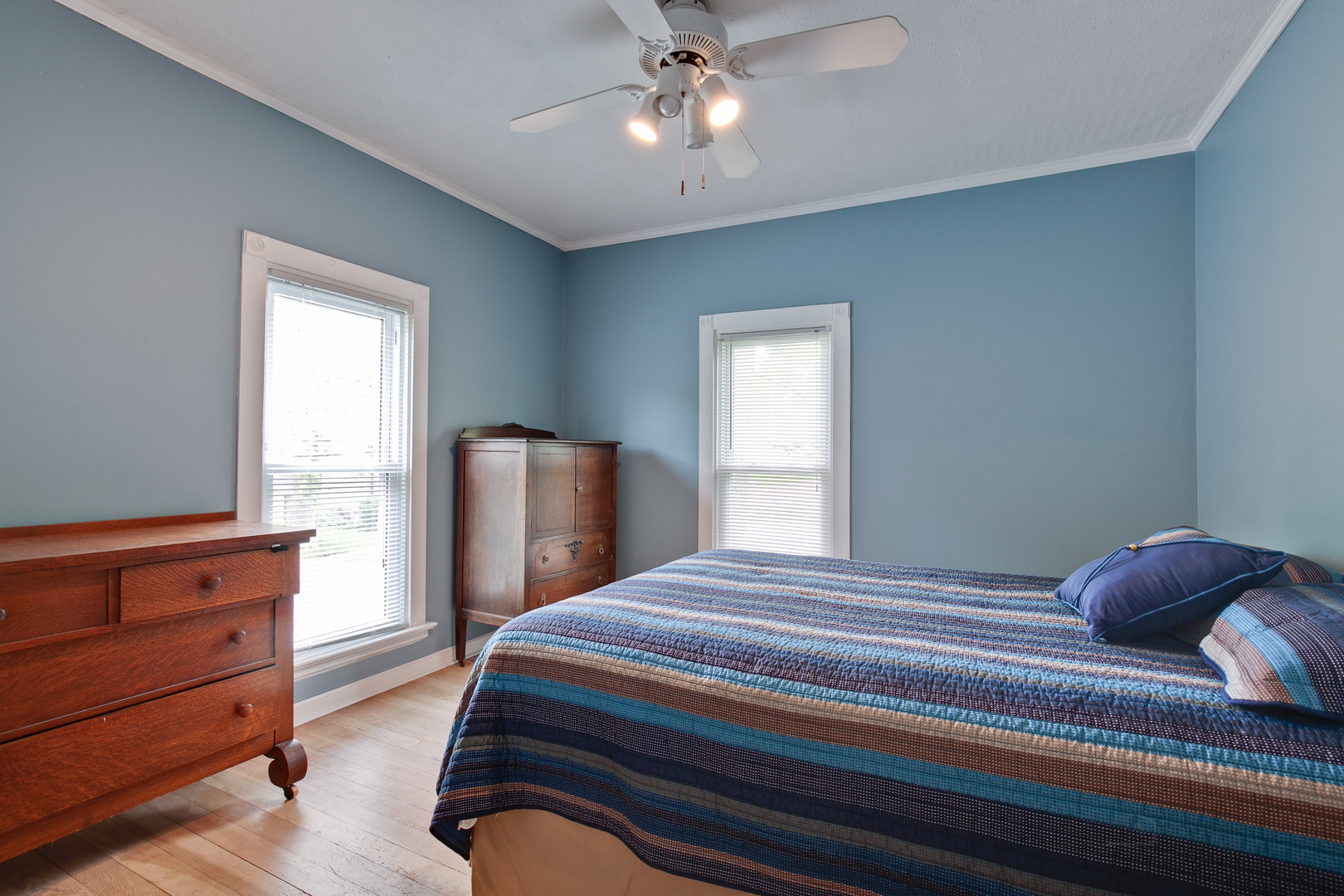 231 Spring Street Cary, IL 60013 - Photo 14 of 20 a bedroom with a bed and window