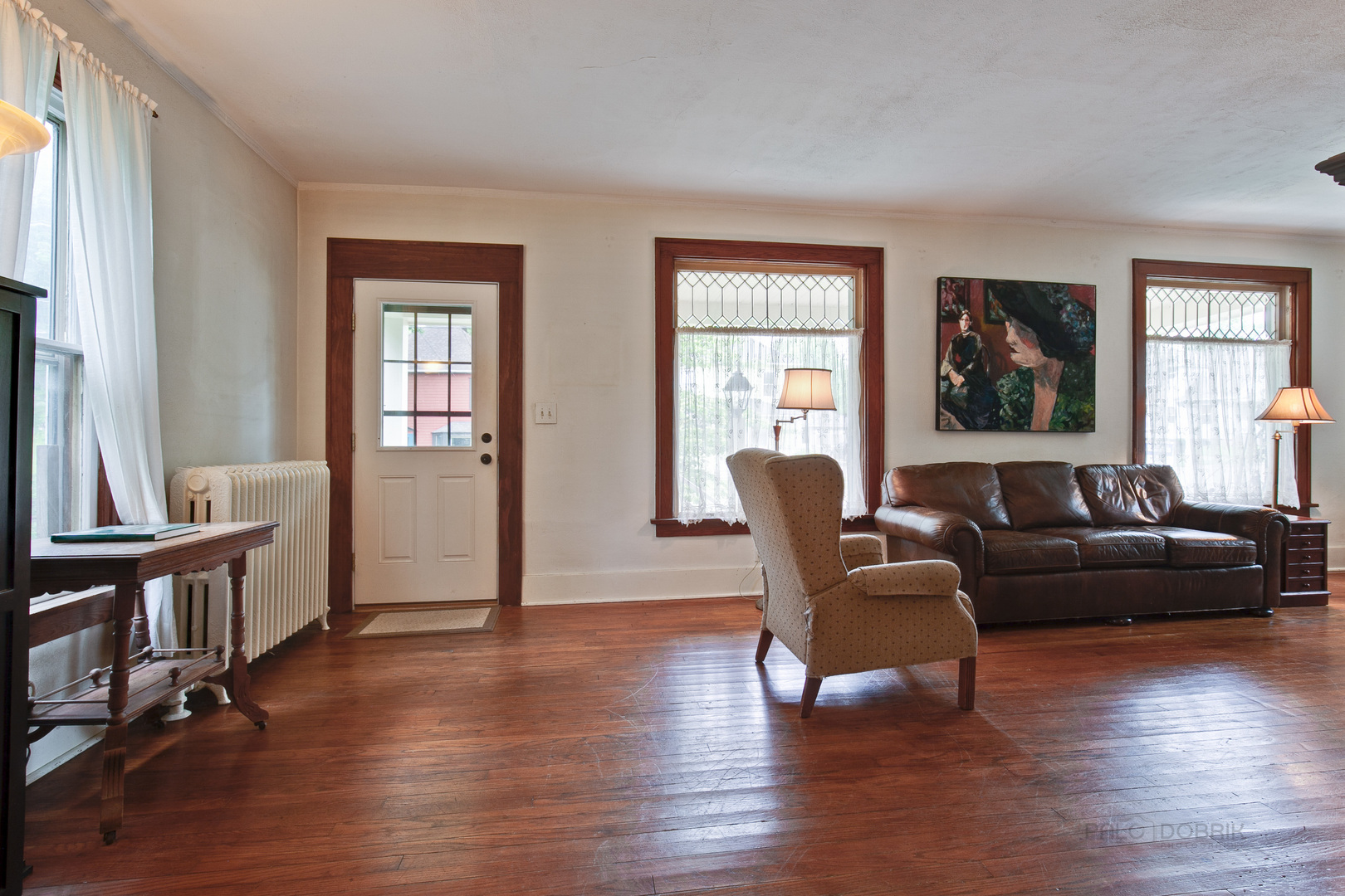 231 Spring Street Cary, IL 60013 - Photo 5 of 20 a living room with furniture and a window