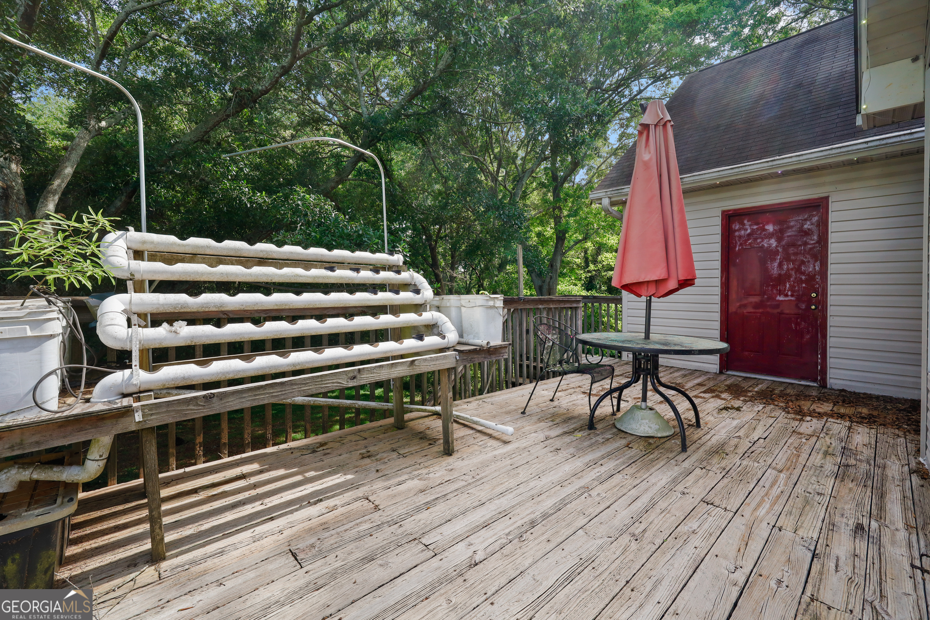 2433 Bear Creek Road Statham, GA 30666 - Photo 48 of 58 a view of a chairs and tables in the balcony