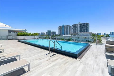 a view of a swimming pool with a terrace