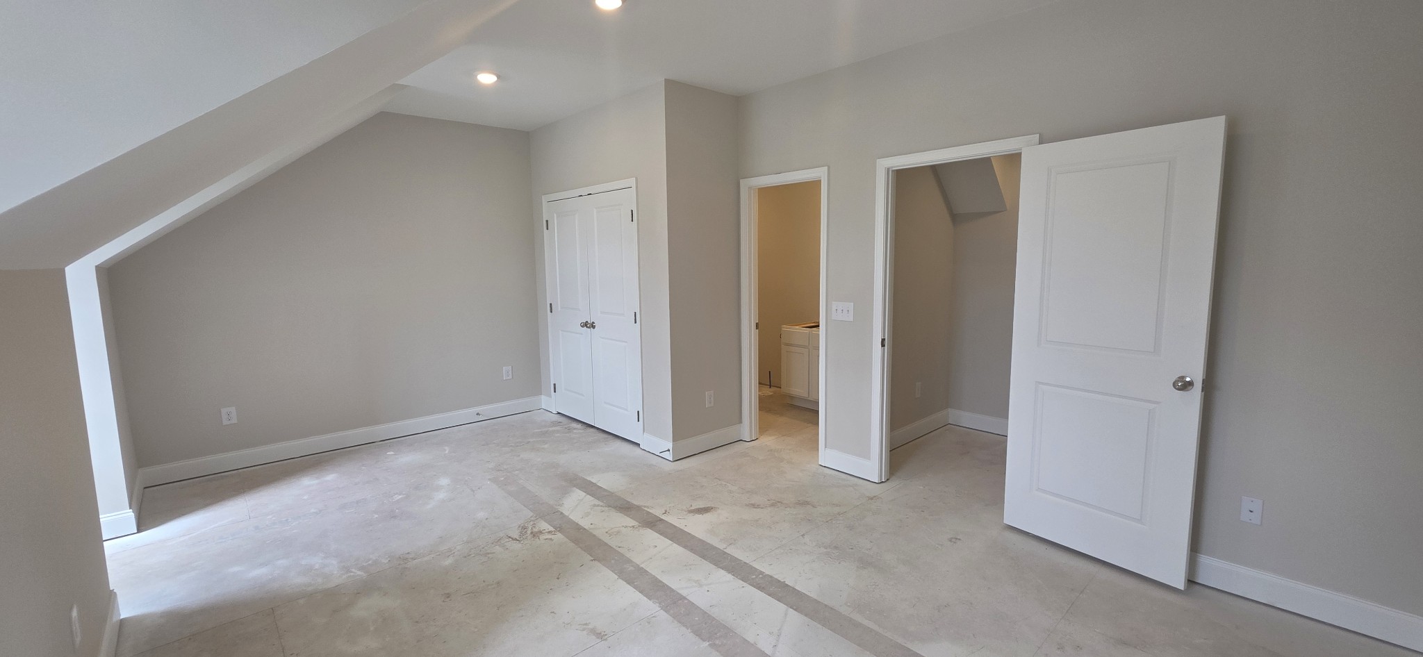 3207 Tasker Drive Antioch, TN 37013 - Photo 19 of 21 a view of livingroom with an empty space and a hallway