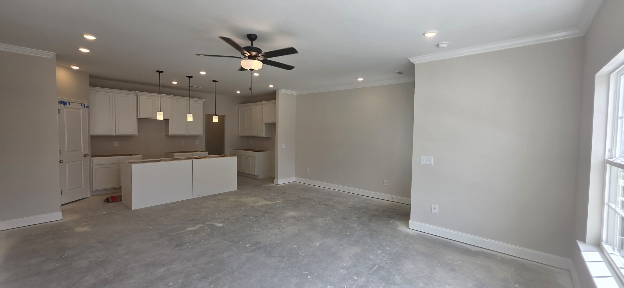 3207 Tasker Drive Antioch, TN 37013 - Photo 8 of 21 a large room with kitchen view and a refrigerator