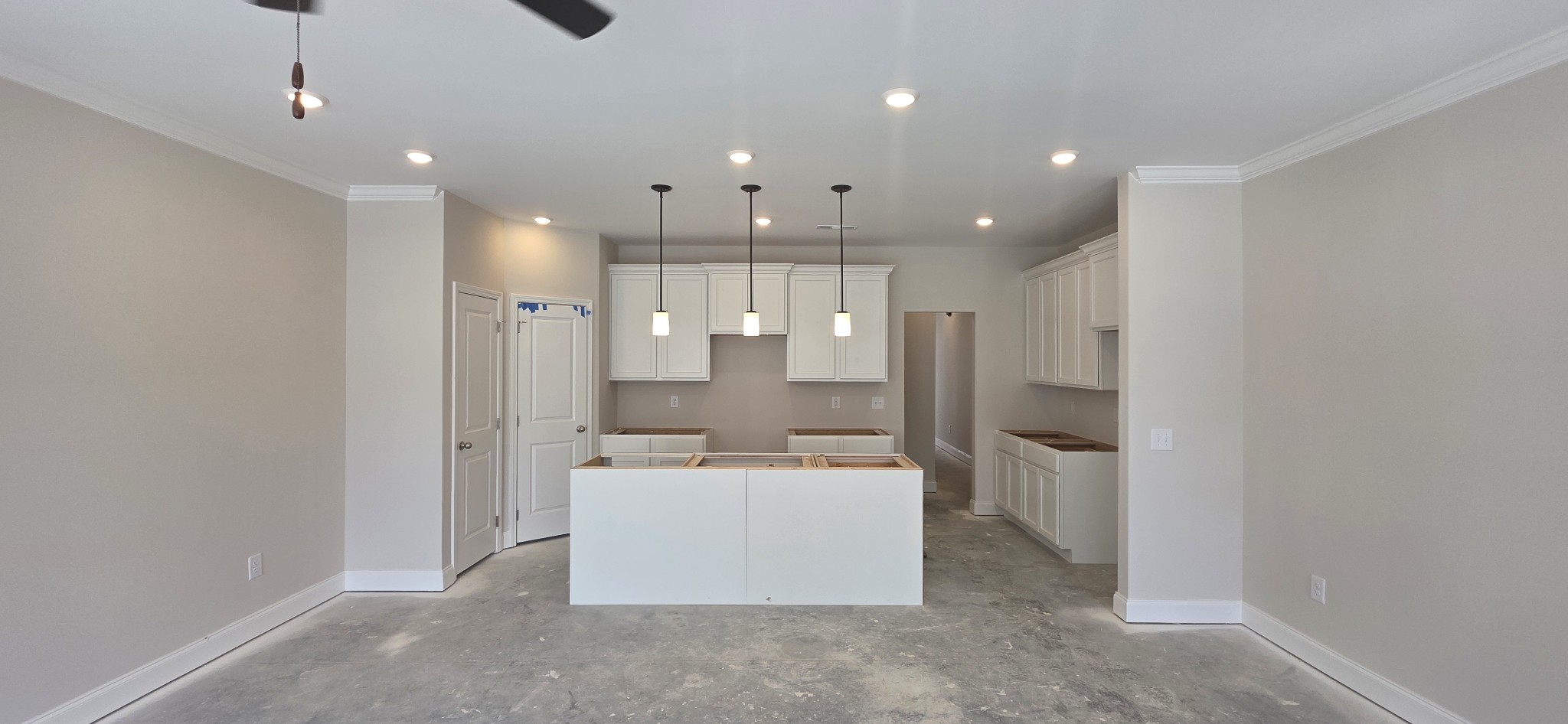3207 Tasker Drive Antioch, TN 37013 - Photo 9 of 21 a view of a kitchen with a sink and dishwasher a refrigerator with wooden floor