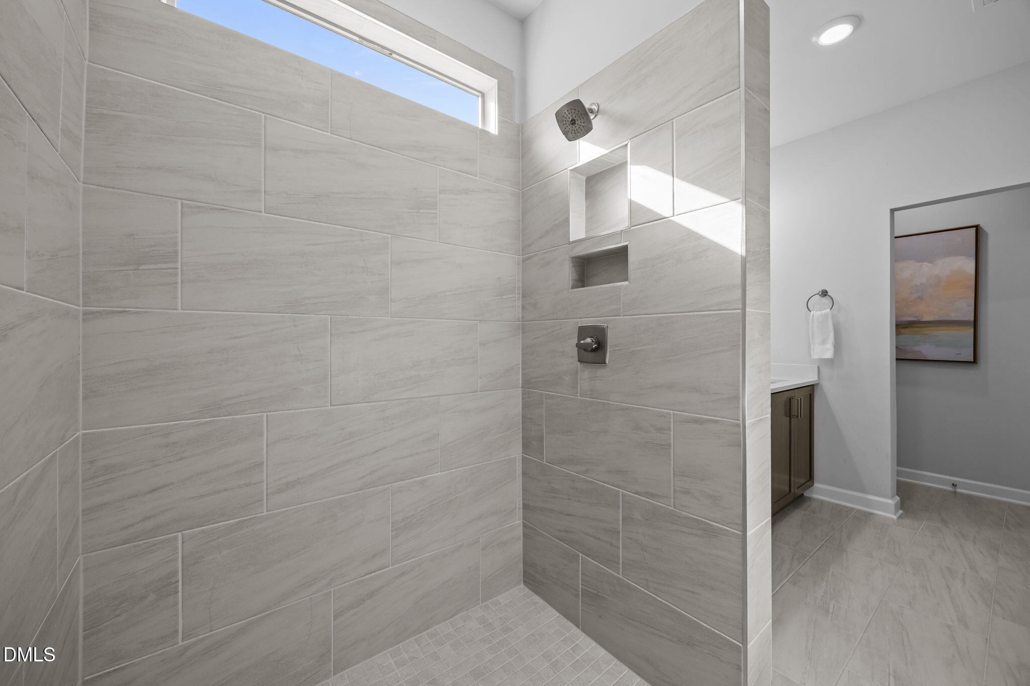 1405 Rich Inlet Cary, NC 27519 - Photo 17 of 44 a bathroom with a shower