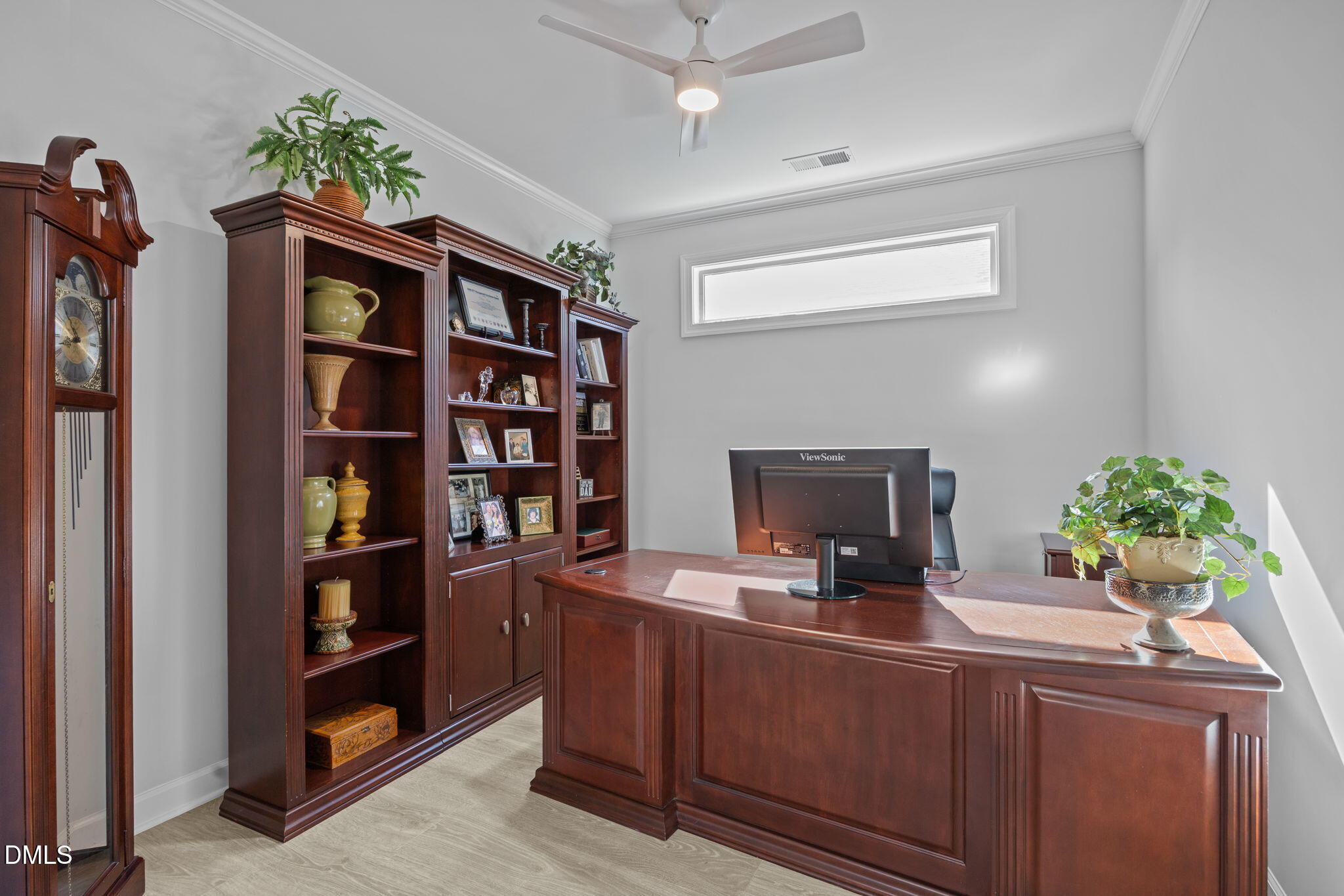 1405 Rich Inlet Cary, NC 27519 - Photo 18 of 44 a view of living room with furniture and book shelf