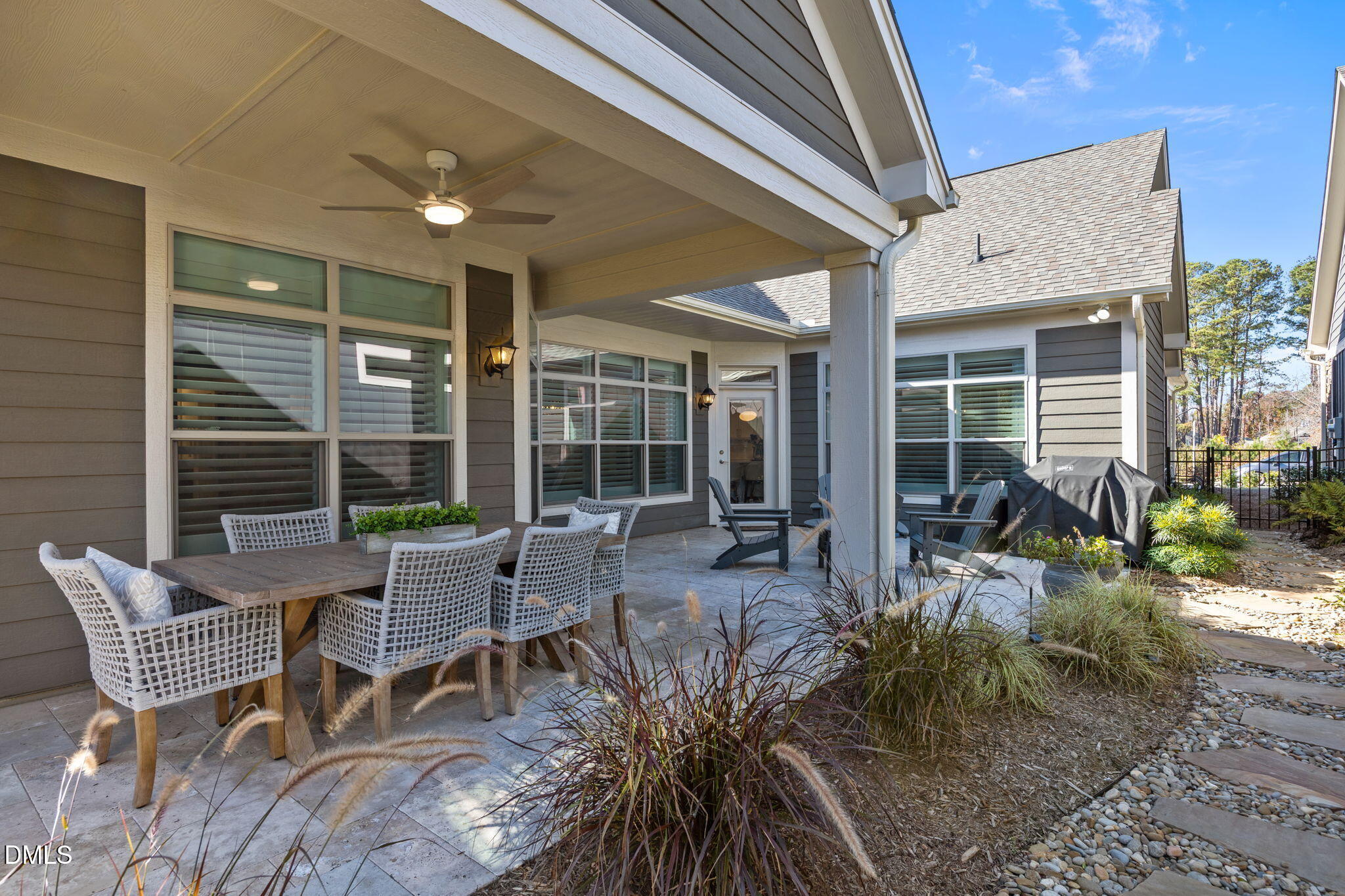 1405 Rich Inlet Cary, NC 27519 - Photo 32 of 44 a view of a patio with table and chairs and potted plants