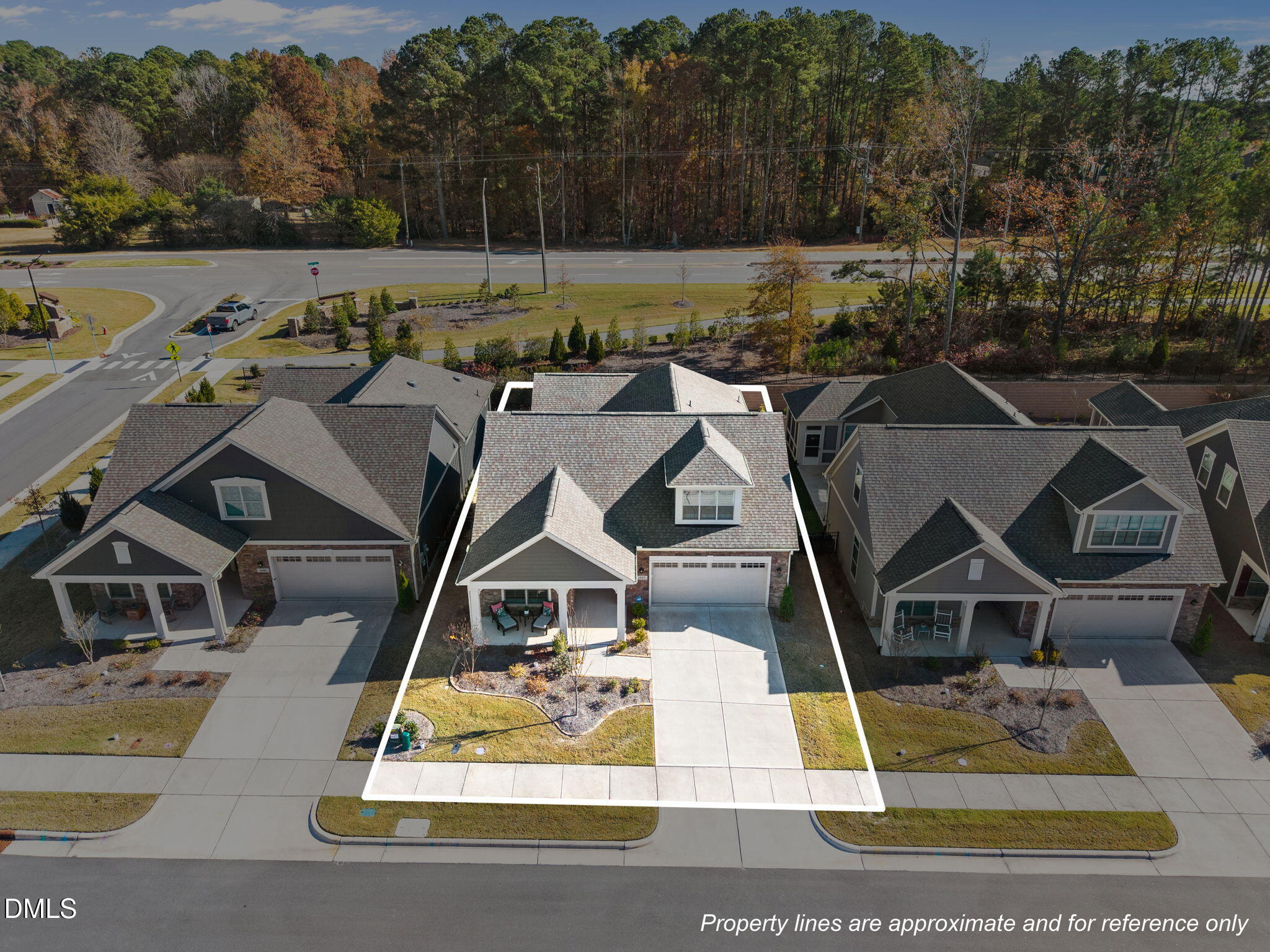 1405 Rich Inlet Cary, NC 27519 - Photo 36 of 44 an aerial view of a house with swimming pool and garden