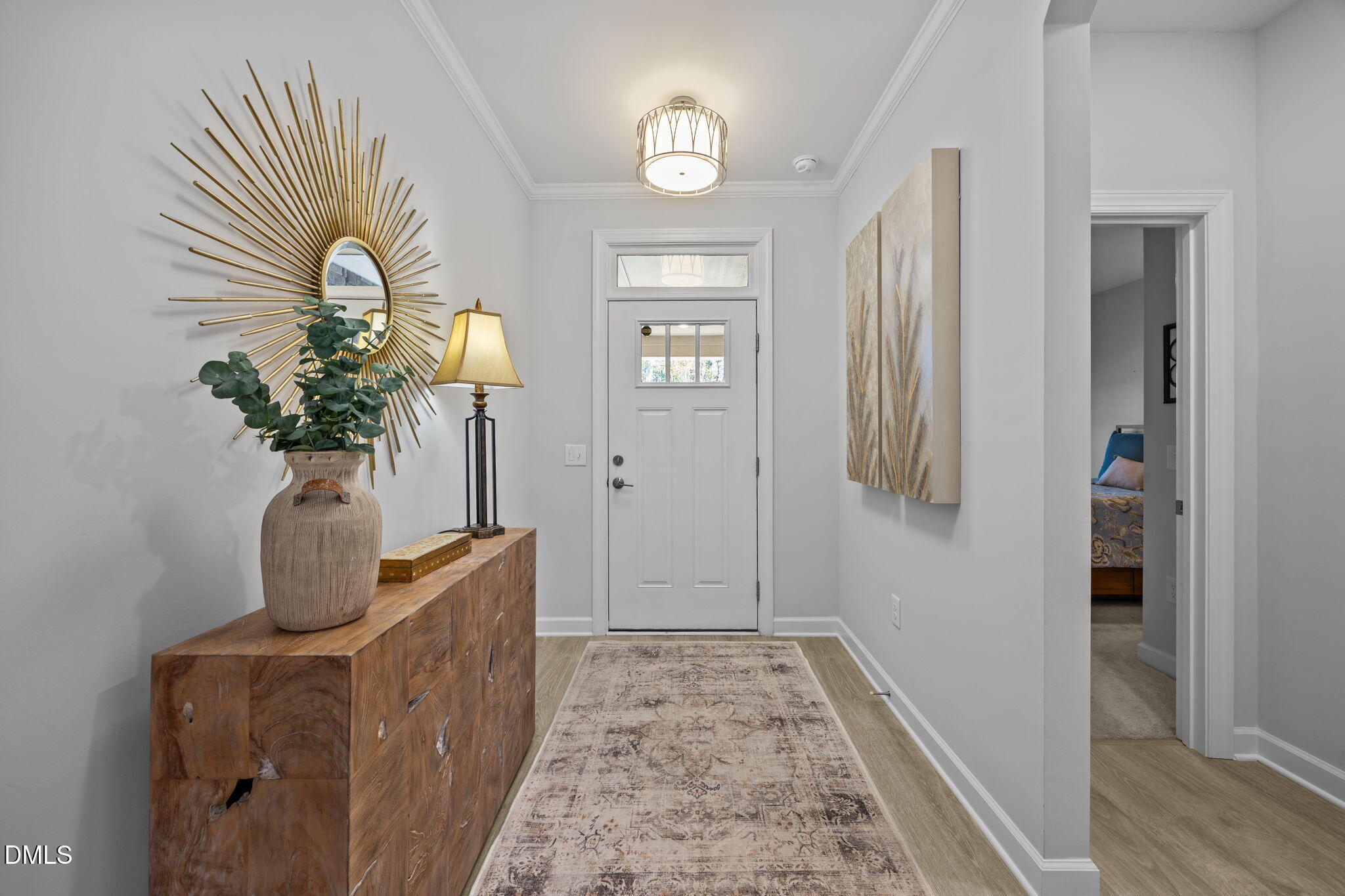 1405 Rich Inlet Cary, NC 27519 - Photo 3 of 44 a view of hallway with wooden floor