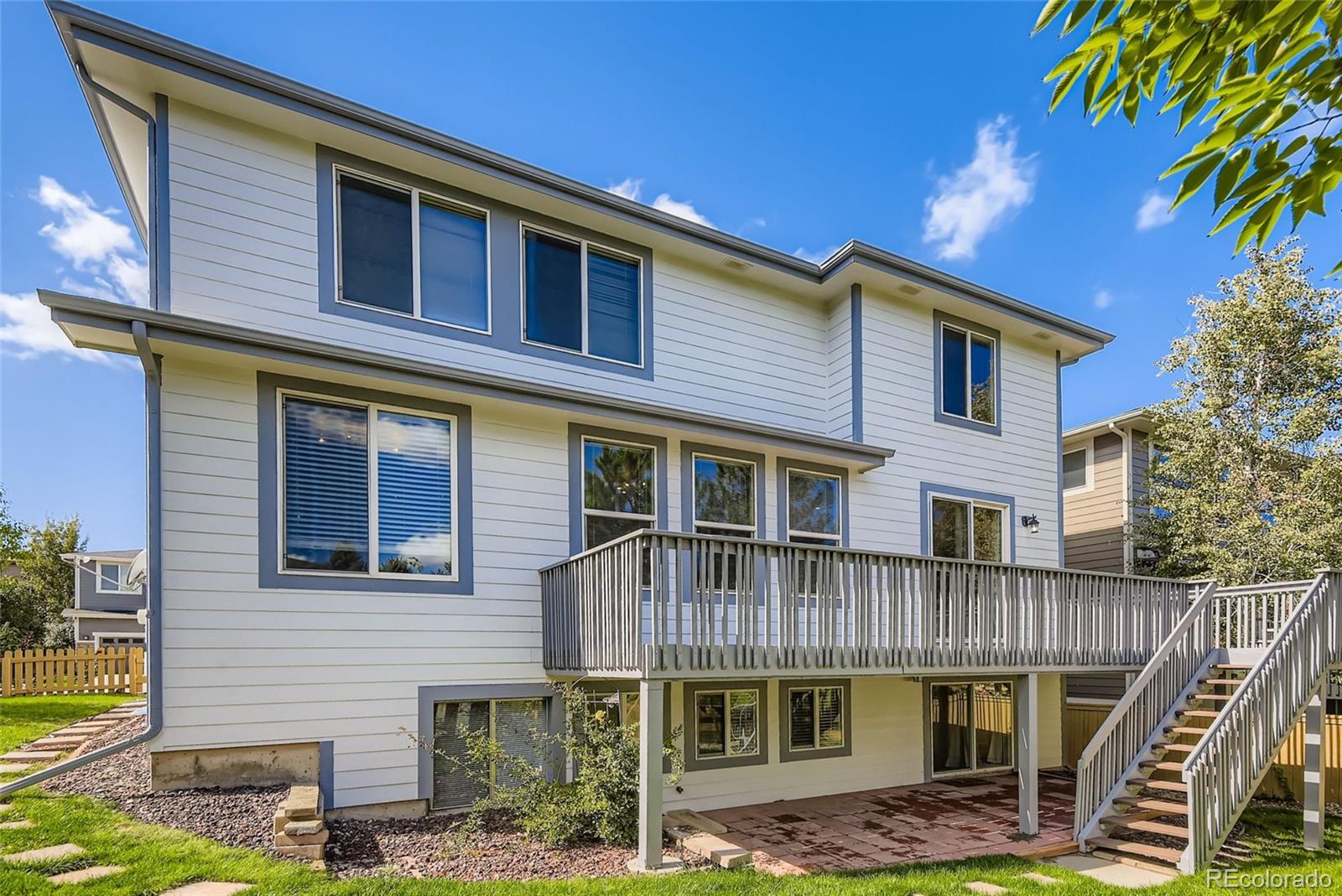 10726 Middlebury Way Highlands Ranch, CO 80126 - Photo 26 of 30 a front view of a house with a yard