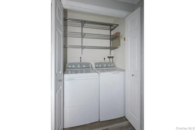 a room with a sink and cabinets