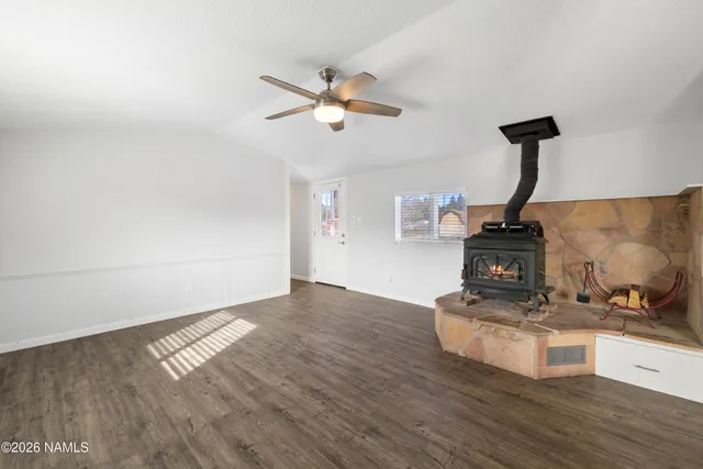 a view of kitchen island with wooden floor