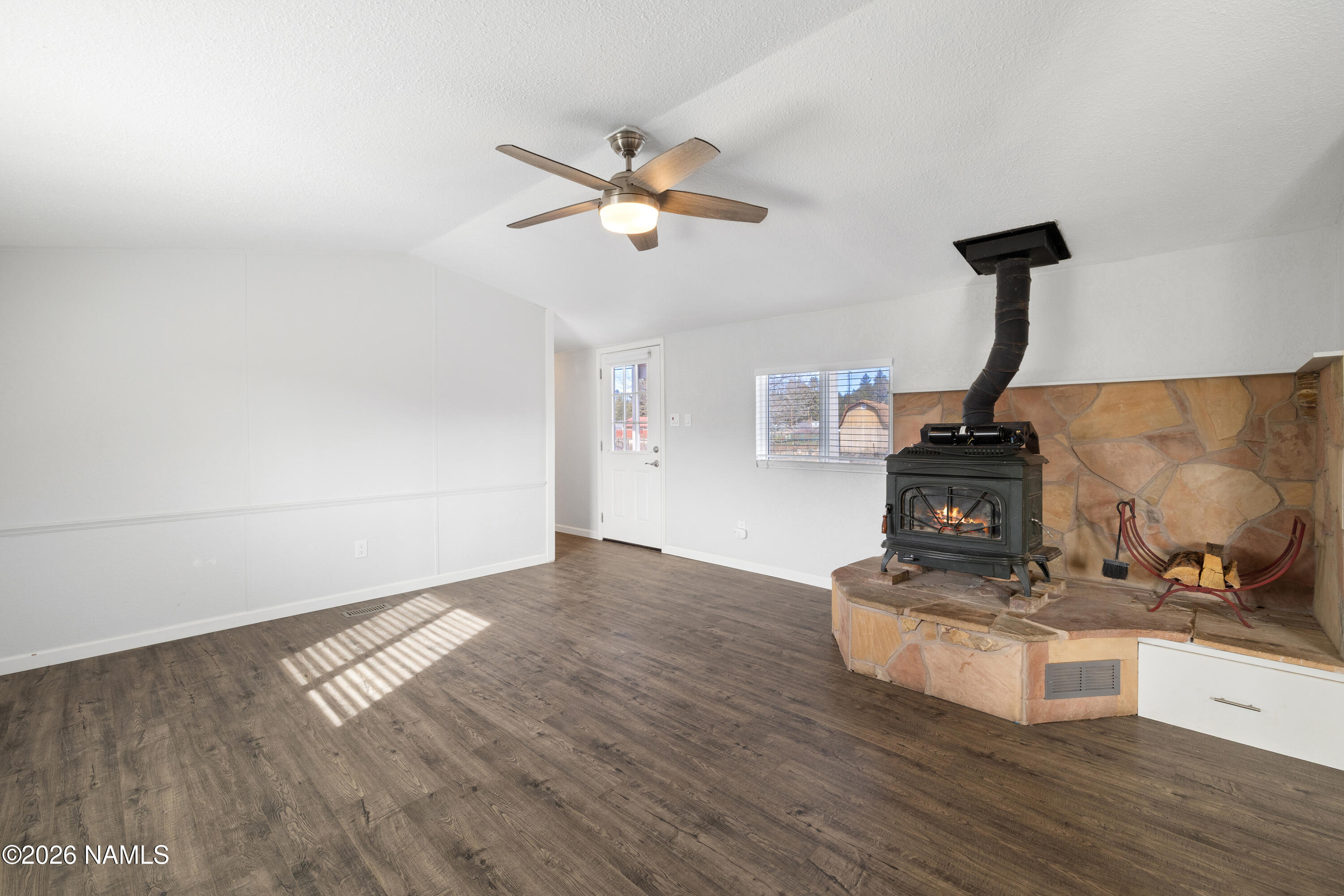 4805 South Thorn Road, Unit 8 Flagstaff, AZ 86005 - Photo 11 of 38 Cozy up around this Wood Burning Stove