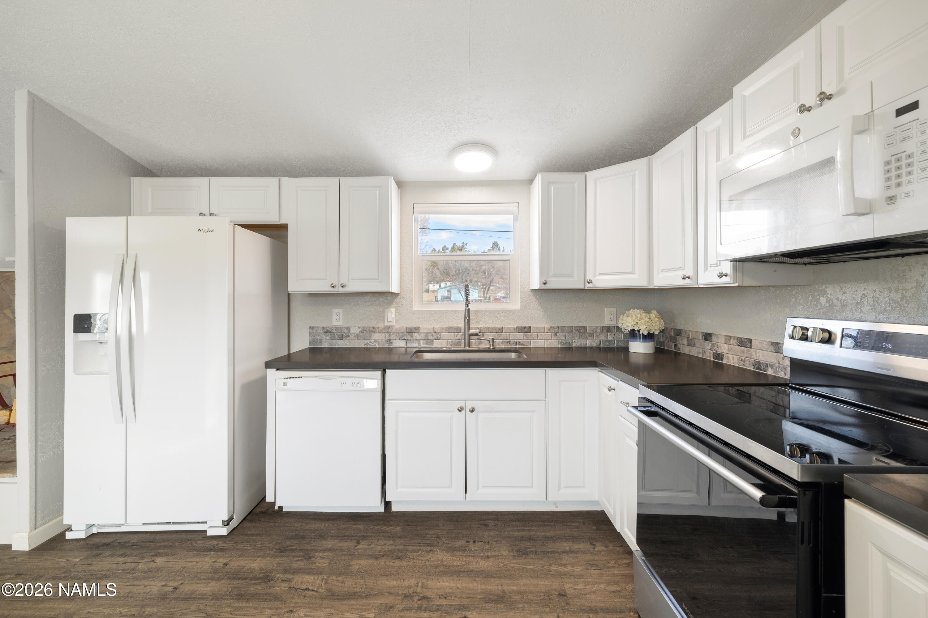 4805 South Thorn Road, Unit 8 Flagstaff, AZ 86005 - Photo 18 of 38 Kitchen with Tons of Natural Light