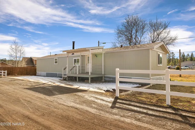 a view of a house with a garage