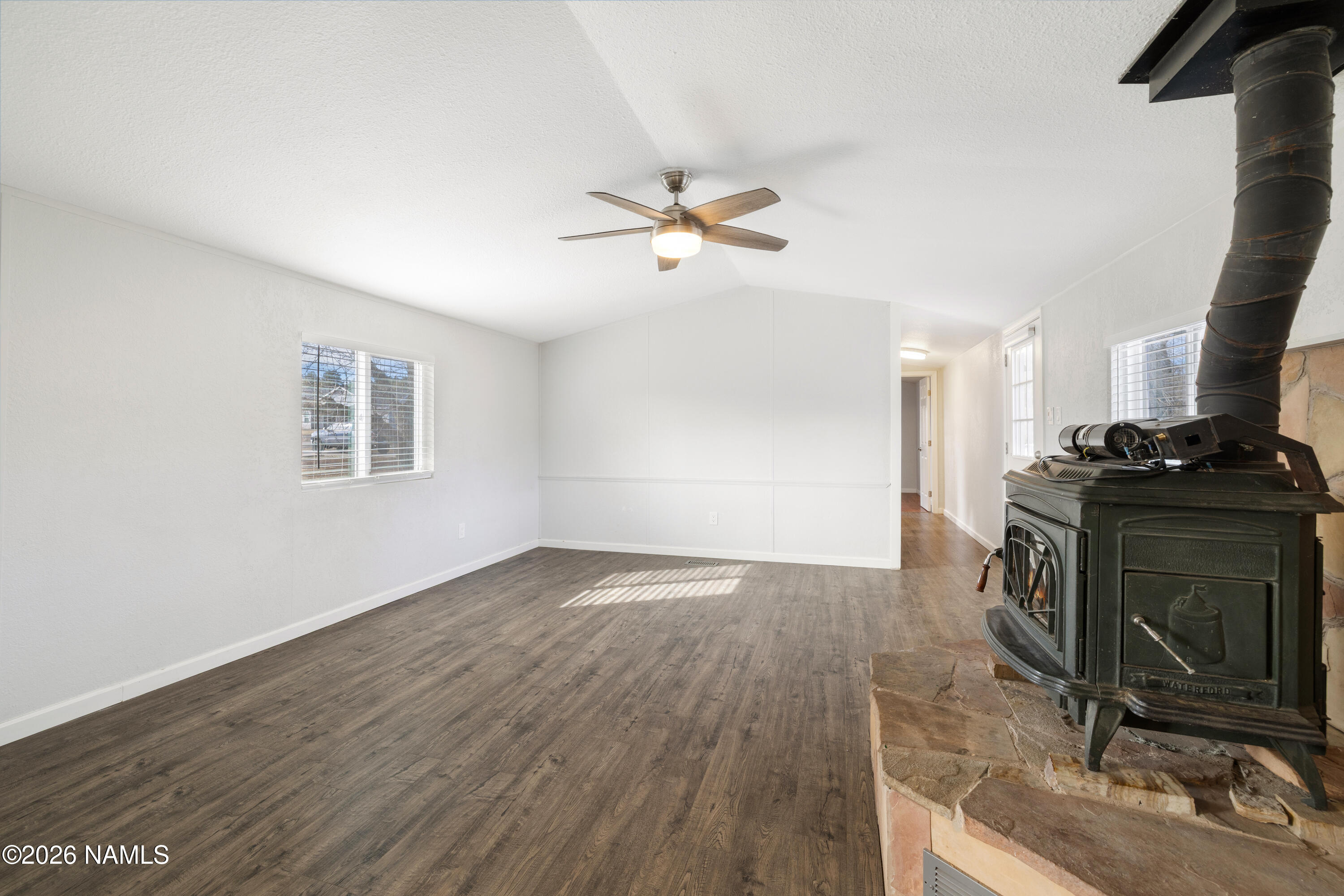 4805 South Thorn Road, Unit 8 Flagstaff, AZ 86005 - Photo 9 of 38 Living Room + Wood Burning Stove