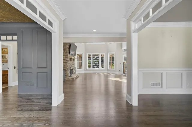 a kitchen with a sink cabinets and window