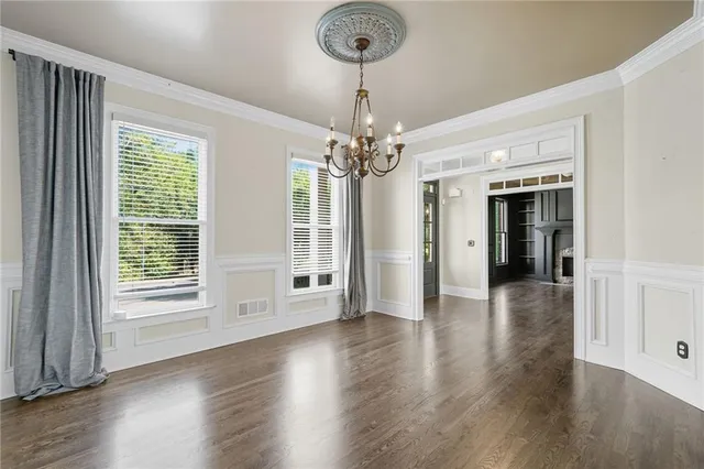 a bedroom with a bed furniture and a fireplace