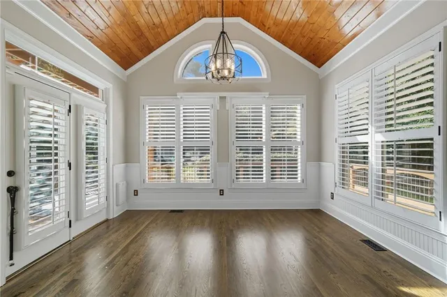 a view of an empty room with stairs