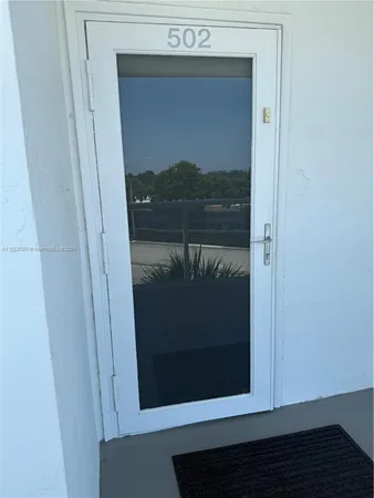 a closeup door with a hallway