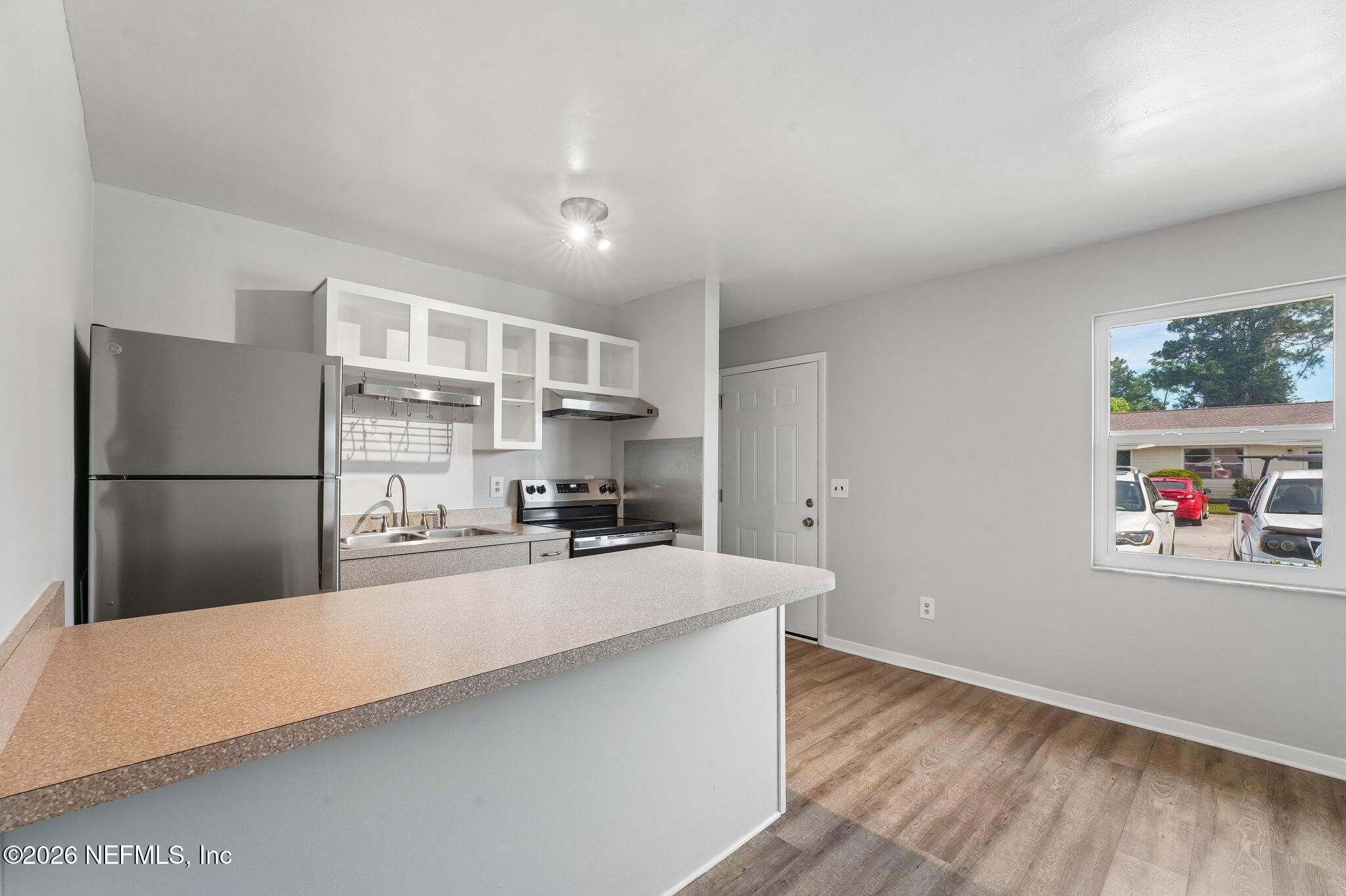 1845 Old Moultrie Road, Unit 24 St. Augustine, FL 32084 - Photo 3 of 11 Entry to Kitchen and Living